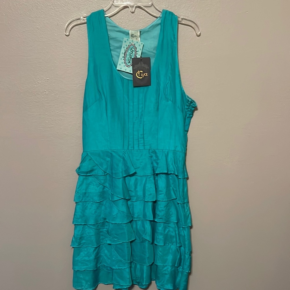 C. Luce aqua blue dress